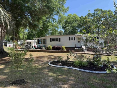 Welcome home to the corner-lot retreat in the desirable Ocean - photo 16