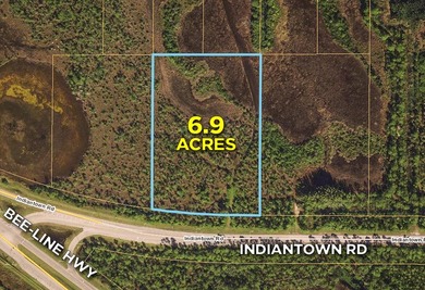 This 6.9 acre lot has an excellent location directly on - photo 1