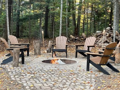 Custom-built Northwoods log sided home offering a rare, fully - photo 3