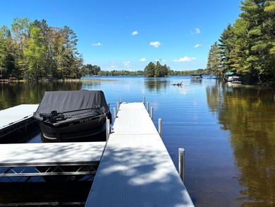 Custom-built Northwoods log sided home offering a rare, fully - photo 4
