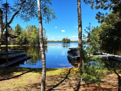 Custom-built Northwoods log sided home offering a rare, fully - photo 6