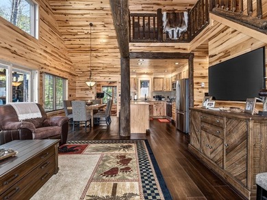 Custom-built Northwoods log sided home offering a rare, fully - photo 7
