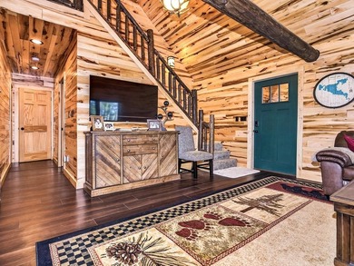 Custom-built Northwoods log sided home offering a rare, fully - photo 9