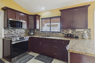 Your dream home awaits! This remarkable 3-bedroom, 2-bath split - photo 6