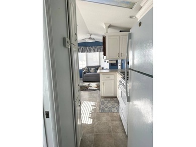 THIS BRIGHT AND UPDATED 2018 PARK MODEL OFFERS A COMFORTABLE AND - photo 18