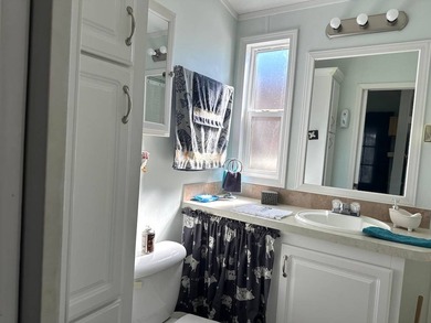 THIS BRIGHT AND UPDATED 2018 PARK MODEL OFFERS A COMFORTABLE AND - photo 19