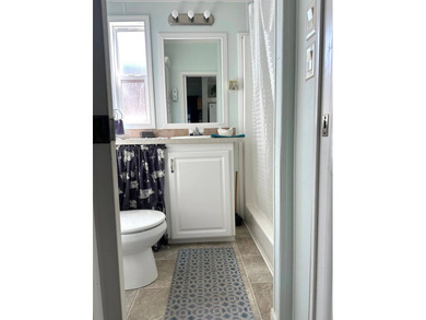 THIS BRIGHT AND UPDATED 2018 PARK MODEL OFFERS A COMFORTABLE AND - photo 21
