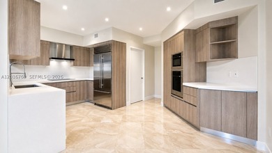 Just steps from the beach, enjoy luxury living in this stunning - photo 3