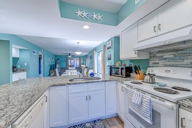 Relax in the large 3rd floor end unit with an Oceanview. The - photo 4