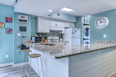 Relax in the large 3rd floor end unit with an Oceanview. The - photo 5