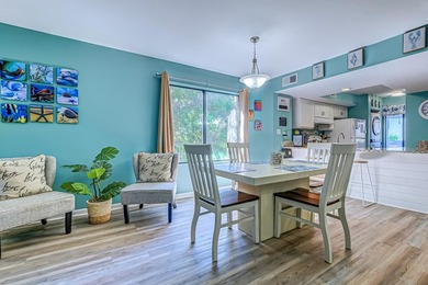 Relax in the large 3rd floor end unit with an Oceanview. The - photo 9