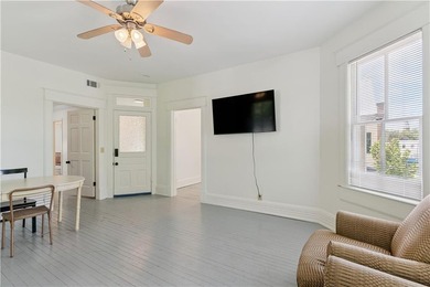 Triplex offering three apartments in this three level home. The - photo 20