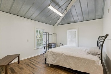 Triplex offering three apartments in this three level home. The - photo 21