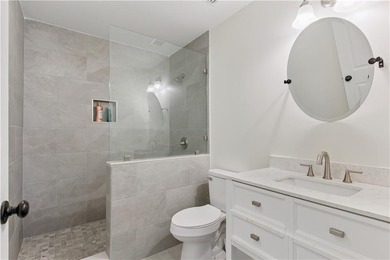 Triplex offering three apartments in this three level home. The - photo 22