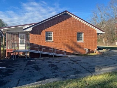 Opportunity awaits in this brick home located close to downtown