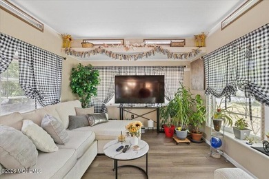 Welcome home! This stylish mobile home offers two bedrooms, a - photo 8