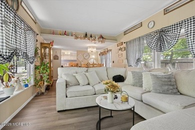 Welcome home! This stylish mobile home offers two bedrooms, a - photo 9