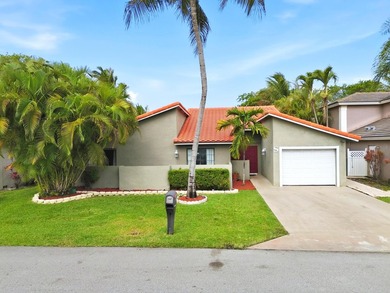 Welcome to Coquina Lakes! This well-maintained 1-story home - photo 1