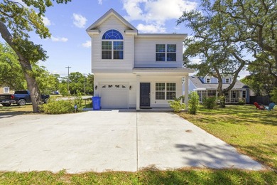 Welcome to 412 N Oak St., Myrtle Beach! This 2023-built 3 - photo 1