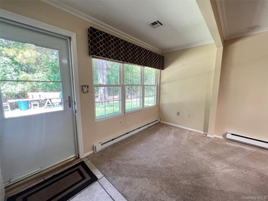 Lovely one bedroom condo in a pretty location. Sunroom wall was - photo 3