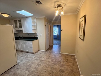 Lovely one bedroom condo in a pretty location. Sunroom wall was - photo 6