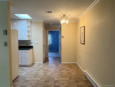 Lovely one bedroom condo in a pretty location. Sunroom wall was - photo 7