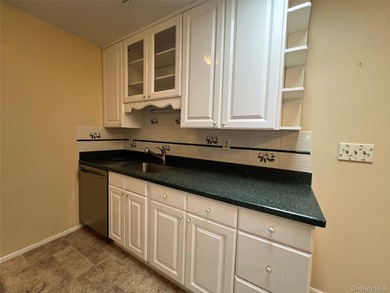 Lovely one bedroom condo in a pretty location. Sunroom wall was - photo 10