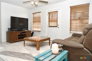 Nestled on a half-acre wooded lot in Rocky Creek Ranch, this - photo 3