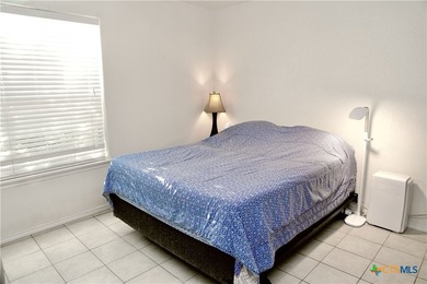 Nestled on a half-acre wooded lot in Rocky Creek Ranch, this - photo 6