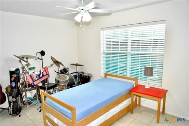 Nestled on a half-acre wooded lot in Rocky Creek Ranch, this - photo 8