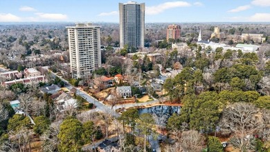 Originally configured as a three-bedroom, three-bath plan, this