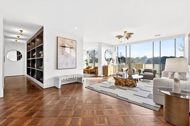 Originally configured as a three-bedroom, three-bath plan, this