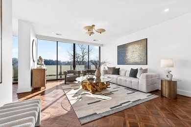 Originally configured as a three-bedroom, three-bath plan, this