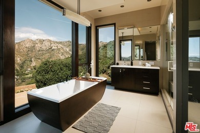 Perched on a private promontory deep within the Santa Monica - photo 7