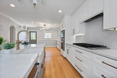 Welcome to this Harbor Hills gem - a beautifully renovated - photo 9