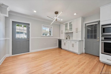 Welcome to this Harbor Hills gem - a beautifully renovated - photo 10