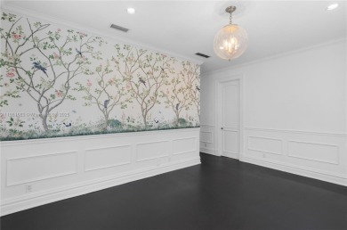 A true masterpiece of timeless elegance, this 6-bedroom, 6