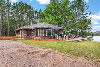 Stunning Northwoods retreat on Lake of the Falls! Enjoy 200 feet - photo 2
