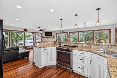 Stunning Northwoods retreat on Lake of the Falls! Enjoy 200 feet - photo 4