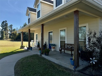 Welcome home to this charming farmhouse-style 3 bedroom, 2 bath - photo 2