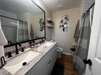 Welcome to the highly sought-after Coach Homes at Errol Estates! - photo 18