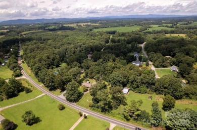 Well-maintained home on a spacious 3.28 acre corner lot in the