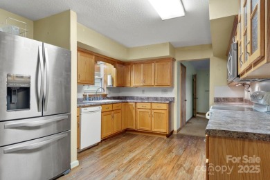 Well-maintained home on a spacious 3.28 acre corner lot in the