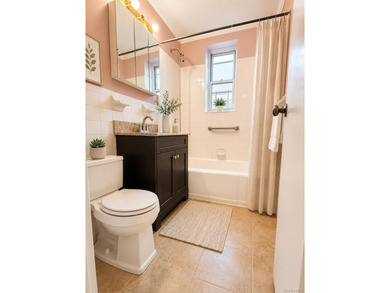Nestled in the heart of Forest Hills, this well-maintained - photo 10