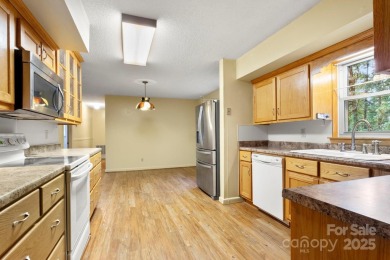 Well-maintained home on a spacious 3.28 acre corner lot in the