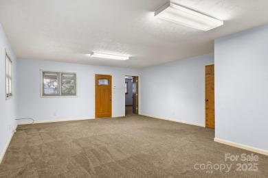 Well-maintained home on a spacious 3.28 acre corner lot in the