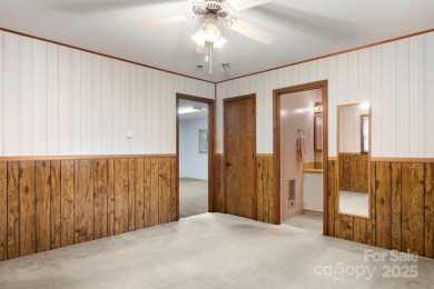 Well-maintained home on a spacious 3.28 acre corner lot in the