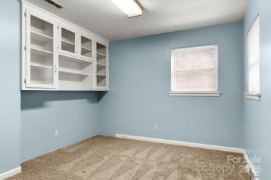 Well-maintained home on a spacious 3.28 acre corner lot in the