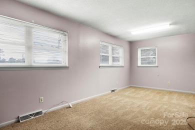 Well-maintained home on a spacious 3.28 acre corner lot in the