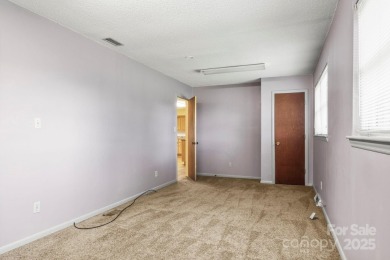 Well-maintained home on a spacious 3.28 acre corner lot in the